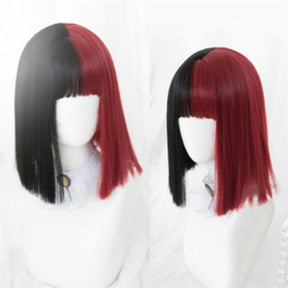 Two mannequin views of the short black-and-red bob wig, showing the straight split-color fringe, center color division and blunt ends.