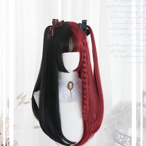 Long straight black-and-red wig with full bangs, styled with high side sections, small bows and a thin red braid, photographed on a white mannequin in a pale room.