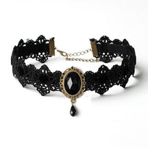 Black lace choker with an ornate oval centerpiece and hanging teardrop shown in a second view of the Black option.