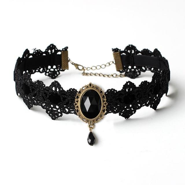 Black lace choker with an ornate oval centerpiece and hanging teardrop shown in a second view of the Black option.