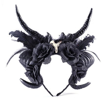 Demon horn headband with tall and curled black horns, black roses and a small skull detail.