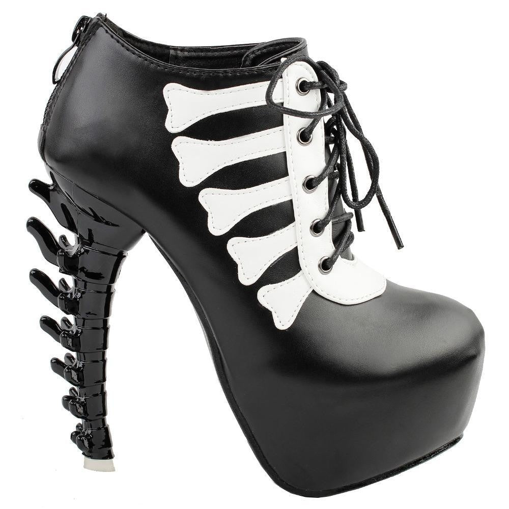 Black platform ankle boot in an outer-side view, showing pale bone-shaped trim, front laces and a sculpted black spine heel.