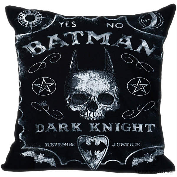 Black square cushion cover with white distressed lettering, a horn-like pointed skull silhouette, bats, pentagrams and a printed planchette.