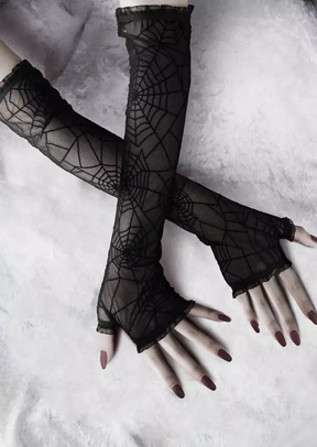Black spiderweb gloves shown in a closer view of the fingerless hand openings.