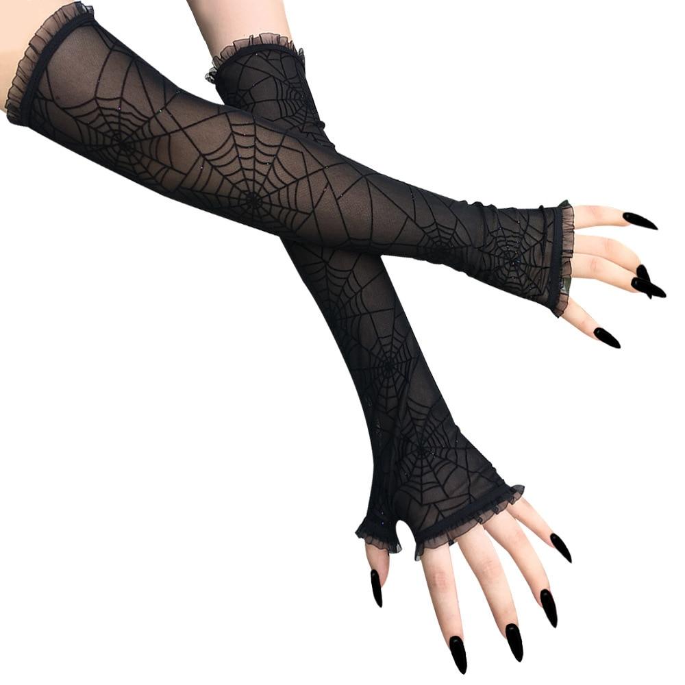 Black spiderweb gloves shown as long fingerless gloves on crossed arms.