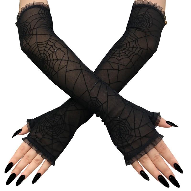 Black spiderweb gloves showing the web pattern across crossed forearms.