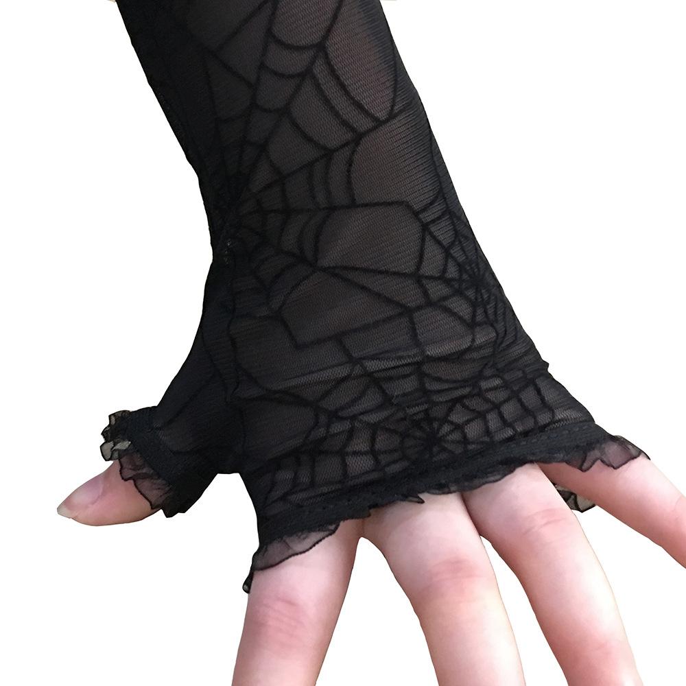 Black spiderweb gloves with a close view of the fingerless hand opening.