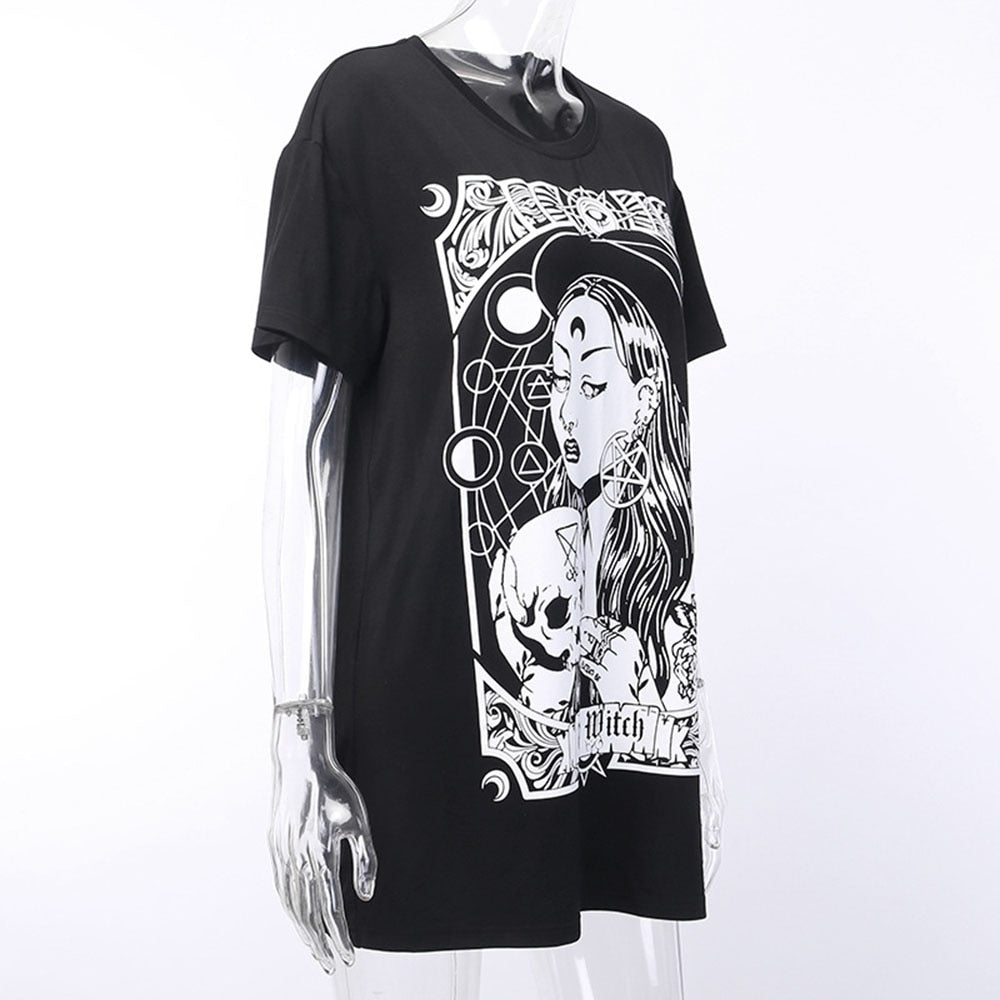 Black The Witch tarot-style graphic T-shirt displayed at an angle on a clear mannequin.