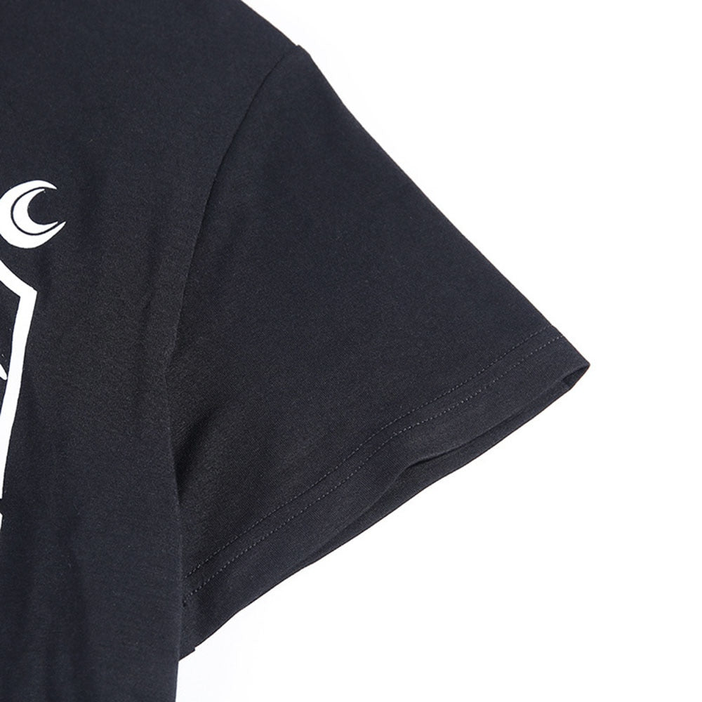 Black The Witch tarot-style graphic T-shirt with a close view of the sleeve seam.