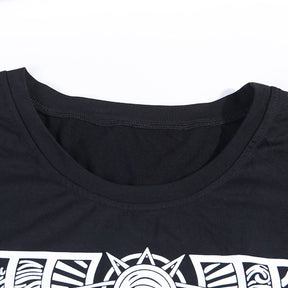 Black The Witch tarot-style graphic T-shirt with a close view of the round neckline.