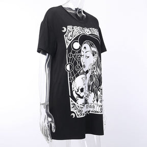 Black The Witch tarot-style graphic T-shirt displayed at a three-quarter angle on a mannequin.