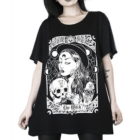 Black The Witch tarot-style graphic T-shirt worn in a front view showing the longer cut.
