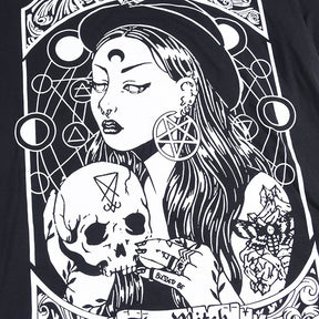 Black The Witch tarot-style graphic T-shirt with a close worn view of the portrait and skull.