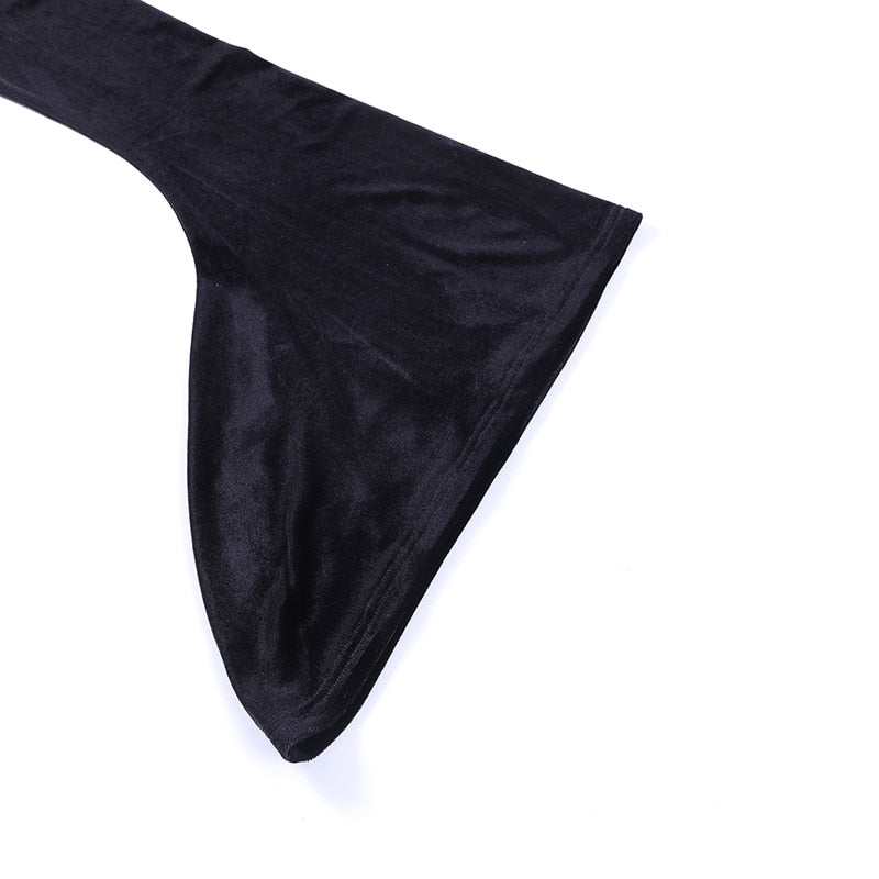 One long black velvet sleeve laid flat on white, widening into a pointed bell cuff.