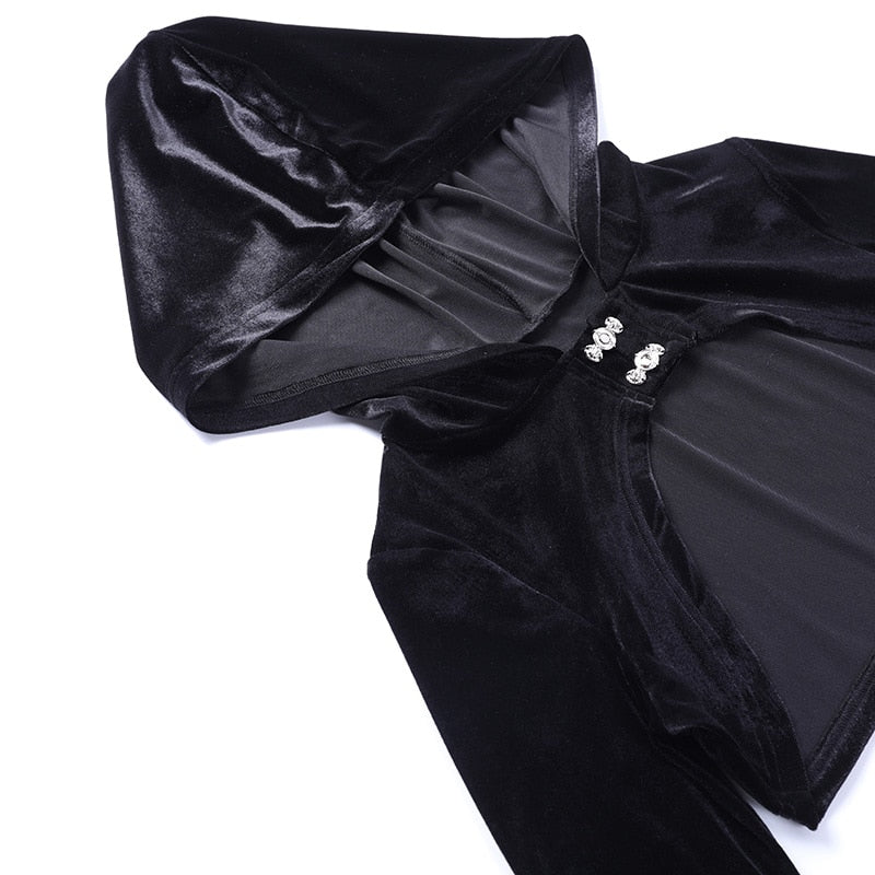 The black hooded bolero arranged flat on white, with the hood open and one long bell sleeve extending toward the lower corner.