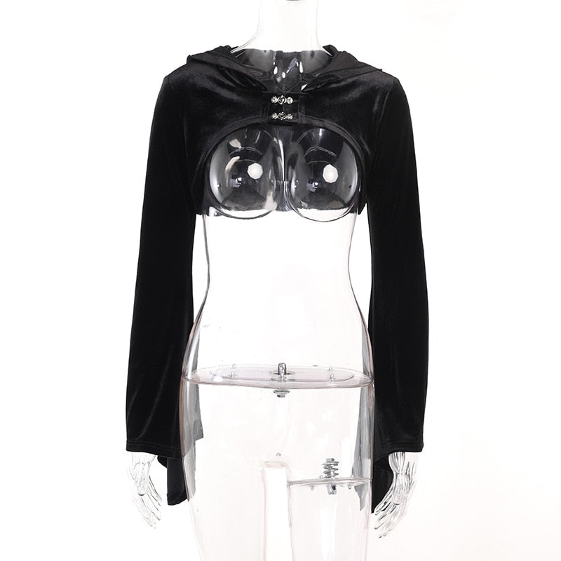 Black velvet hooded bolero shown alone on a clear mannequin, revealing its cropped shape, open front and two clasps without a camisole underneath.