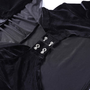 Two decorative clasps shown unfastened at the front of the black velvet hooded overlay, revealing the separate hook and loop halves.