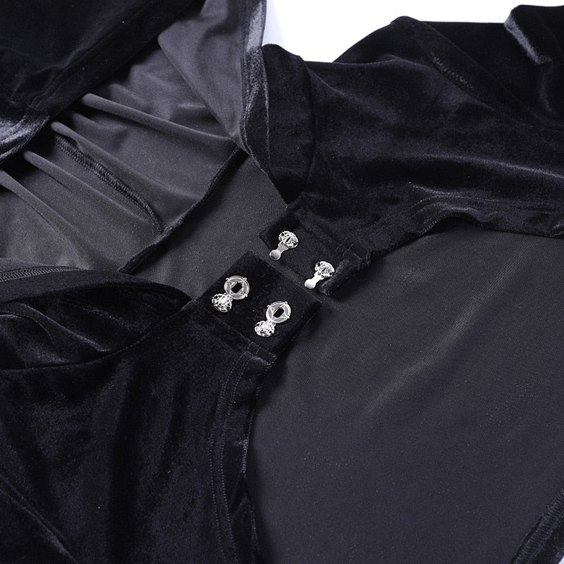 Two decorative clasps shown unfastened at the front of the black velvet hooded overlay, revealing the separate hook and loop halves.