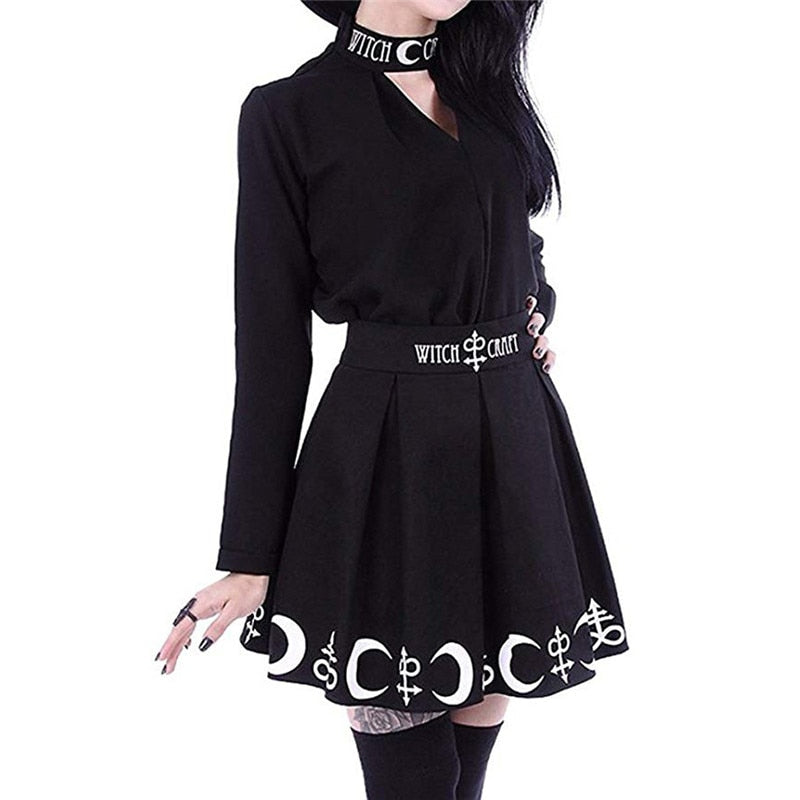 Black Witch Craft skirt styled with a black blouse, choker and thigh-high stockings, showing the waist lettering and crescent hem.