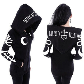 Front and back outfit views of a black zip-up witchcraft hoodie with white sleeve symbols and a large printed hood.