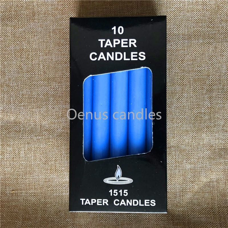 Blue ritual candles with their packaging, arranged to show the slim shape and blue colour.