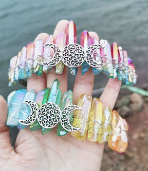 Bright rainbow and soft rainbow crystal crowns held together, comparing vivid multicoloured points with a paler gradient.