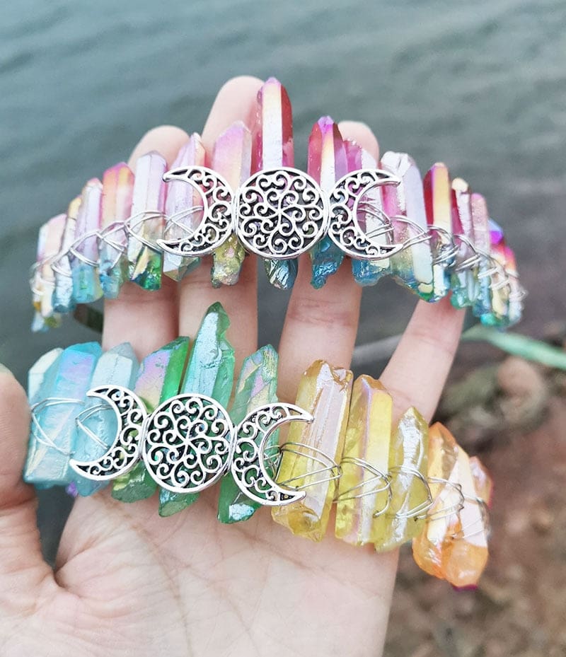 Bright rainbow and soft rainbow crystal crowns held together, comparing vivid multicoloured points with a paler gradient.