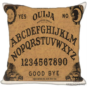 Brown square Ouija pillow cover showing a classic board layout with sun and moon faces, black alphabet arcs, numbers and Good Bye lettering.