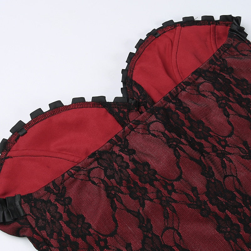 Burgundy strapless corset top with black floral lace showing the inside of the red bodice.