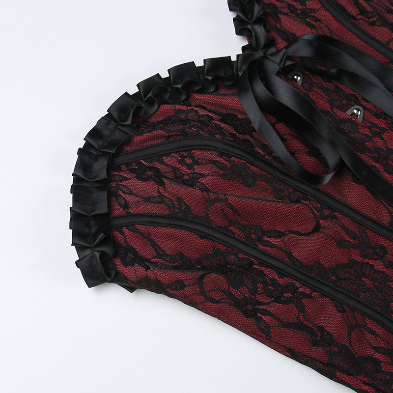 Burgundy strapless corset top with black floral lace with a close view of the ruffled neckline and ribbon bow.