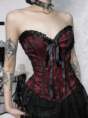 Burgundy strapless corset top with black floral lace shown at an angle.