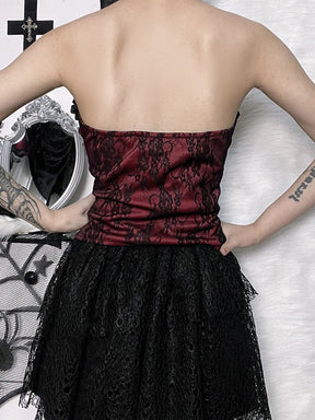 Burgundy strapless corset top with black floral lace shown from the back.
