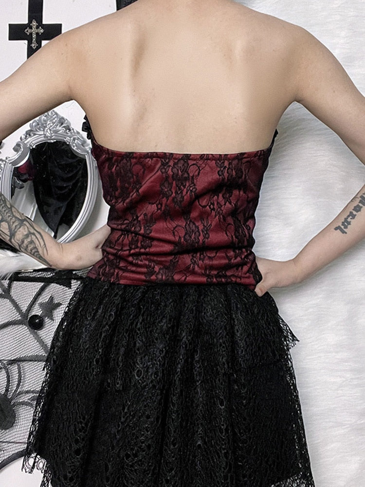 Burgundy strapless corset top with black floral lace shown from the back.