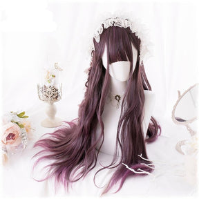 Long burgundy wavy wig viewed from the front on a white mannequin. Full bangs, a small side braid and a white lace headpiece frame the face above the flowing lengths.