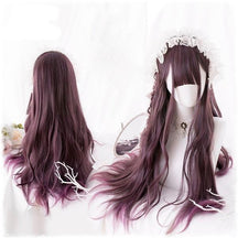 Front and back views of a long burgundy gothic wig on white mannequin heads. Loose waves fall below the shoulders, with full bangs and a white lace headpiece in the styled front view.