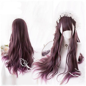 Front and back views of a long burgundy gothic wig on white mannequin heads. Loose waves fall below the shoulders, with full bangs and a white lace headpiece in the styled front view.