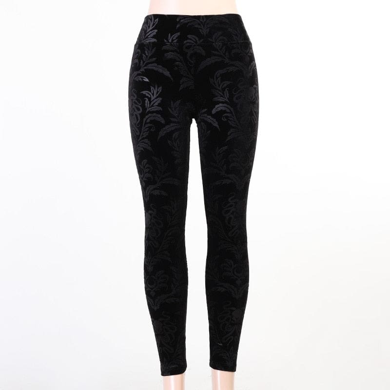 Black Cameo velvet skinny pants displayed against white, showing the full front pattern and tapered-looking fitted leg outline.