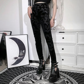 Front view from waist to shoes of the Cameo skinny pants, revealing the subtle black-on-black pattern down both legs.