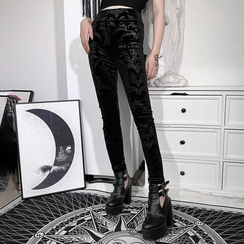 Front view from waist to shoes of the Cameo skinny pants, revealing the subtle black-on-black pattern down both legs.