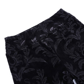 Close view of the broad waistband and central seam on the black Cameo velvet pants.