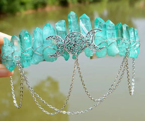 Mint-green crystal crown with three ornate moons and silver-tone chain swags.