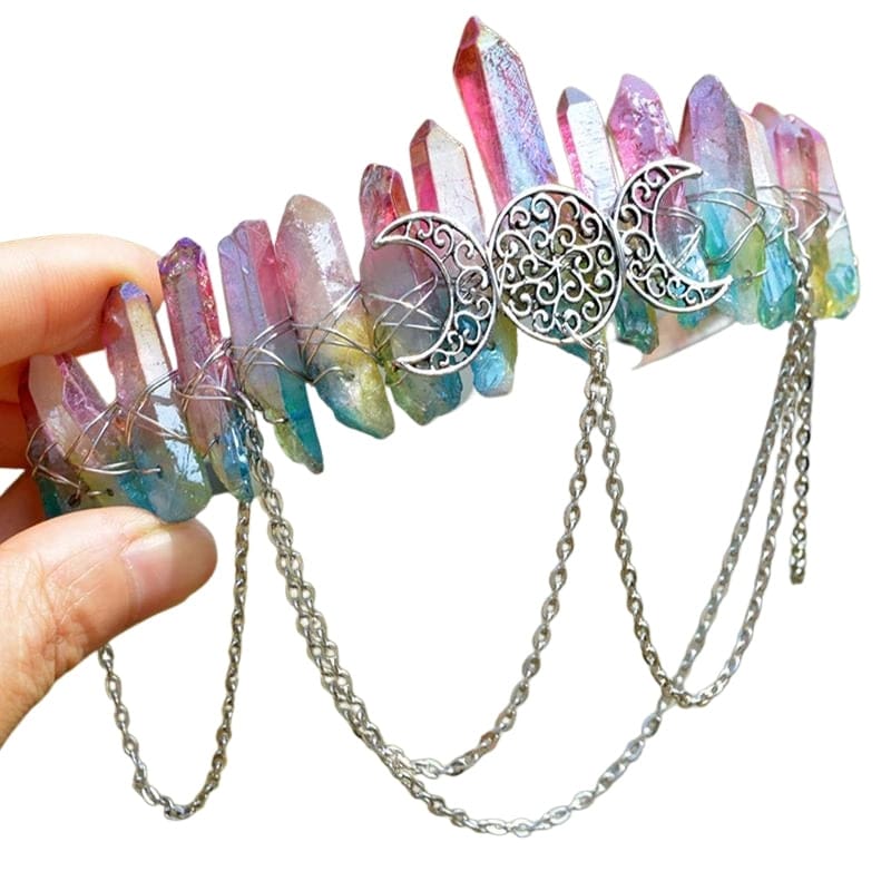 Pink and blue gradient points behind a triple-moon filigree centerpiece and hanging chains.