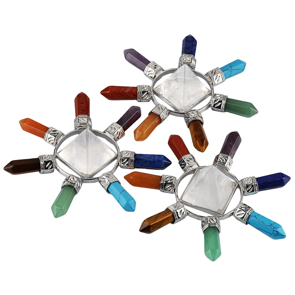 Three examples of the crystal point arrangement displayed together, each with a central pyramid and radiating coloured points.