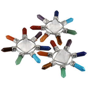 Three examples of the crystal point arrangement displayed together, each with a central pyramid and radiating coloured points.