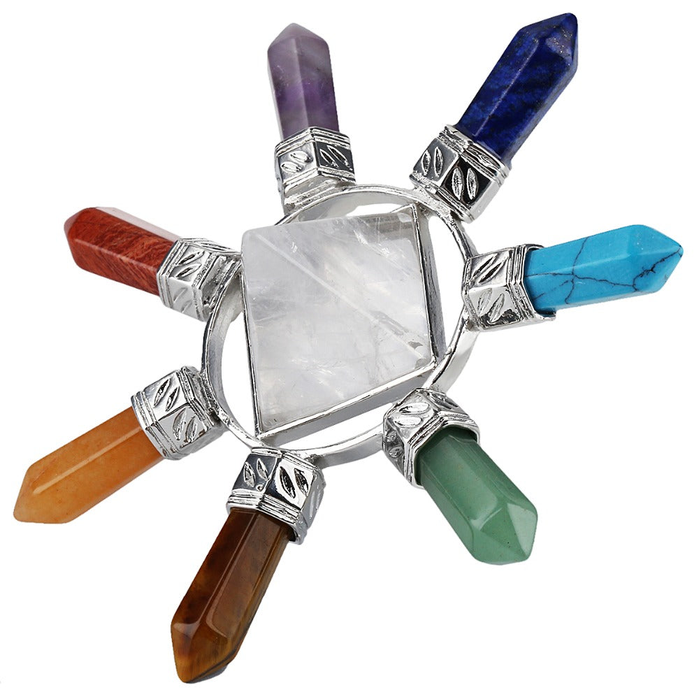 Angled view of the chakra-inspired arrangement, showing outward-facing points in purple, blue, green and warm tones.