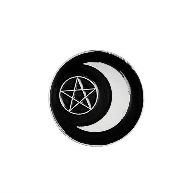 Black crescent-moon pin surrounding a silver-tone outlined pentagram within a circle.