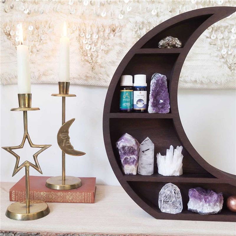 Crescent shelf beside candle holders