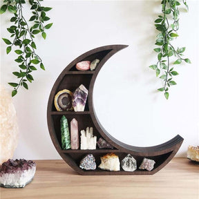 Crescent moon shelf on a wooden cabinet