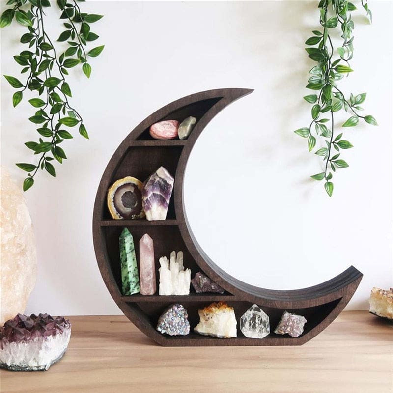 Crescent moon shelf on a wooden cabinet