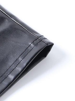 Close view of the black dress hem showing two rows of stitching along the glossy edge.